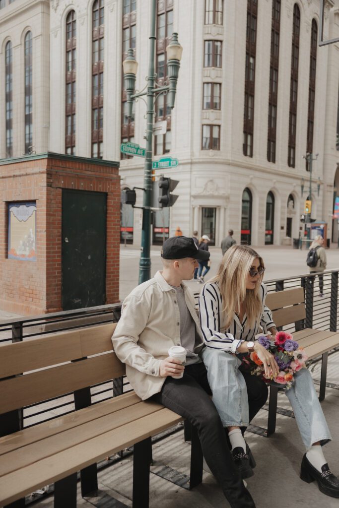 Couple exploring downtown Calgary during their modern edgy couples photoshoot 