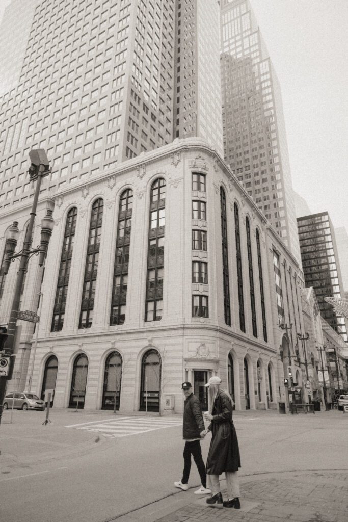 Couple exploring downtown Calgary during their modern edgy couples photoshoot 