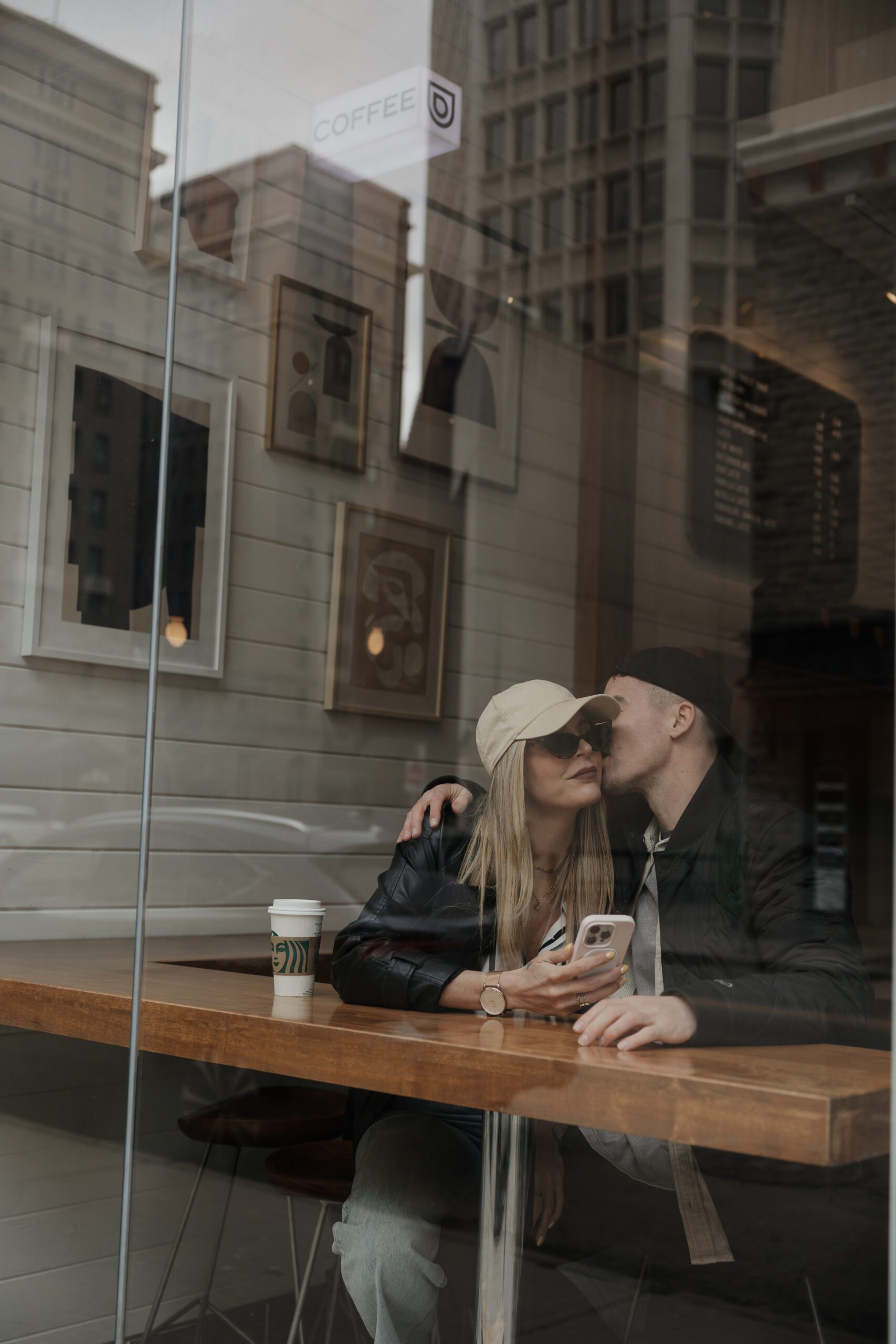 Couple exploring downtown Calgary during their modern edgy couples photoshoot 