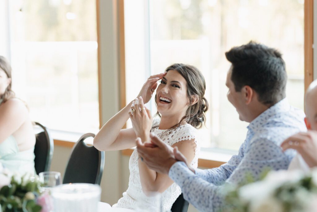 bride and groom celebrating their wedding during their wedding reception