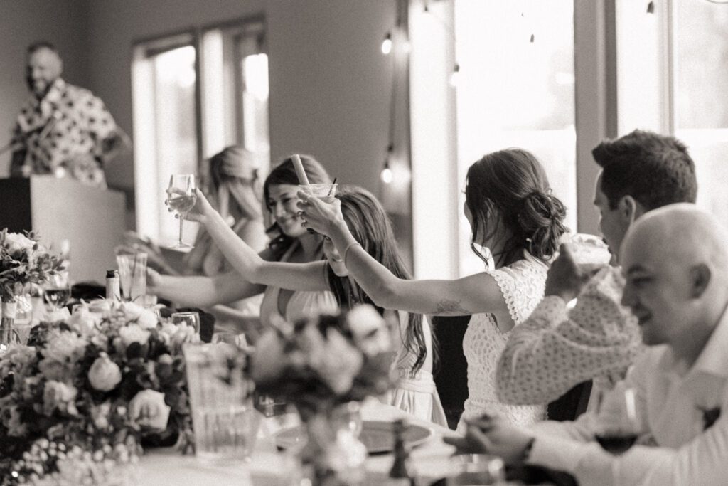 bride and groom celebrating their wedding during their wedding reception