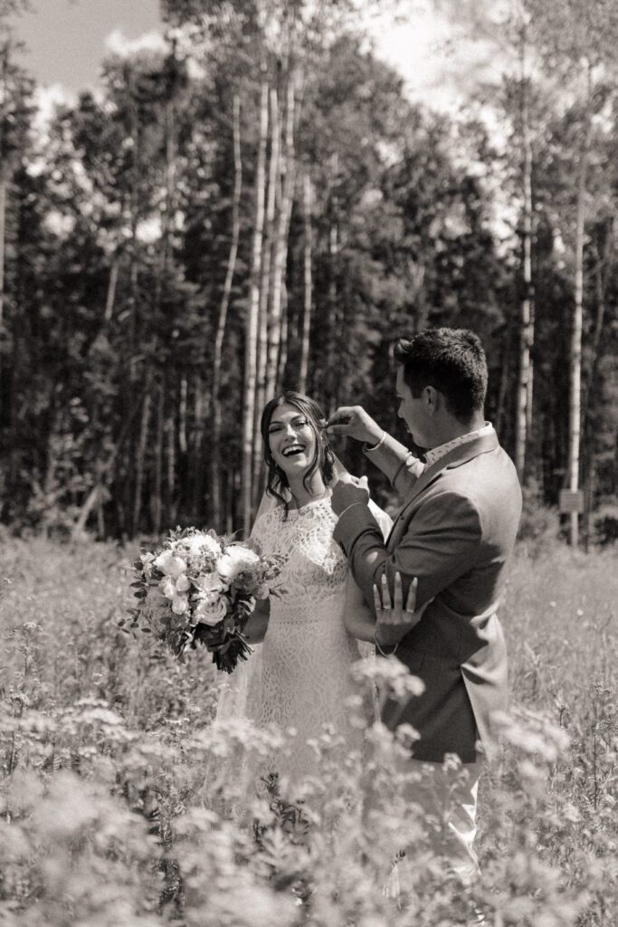 Bride and groom being care free on their wedding day