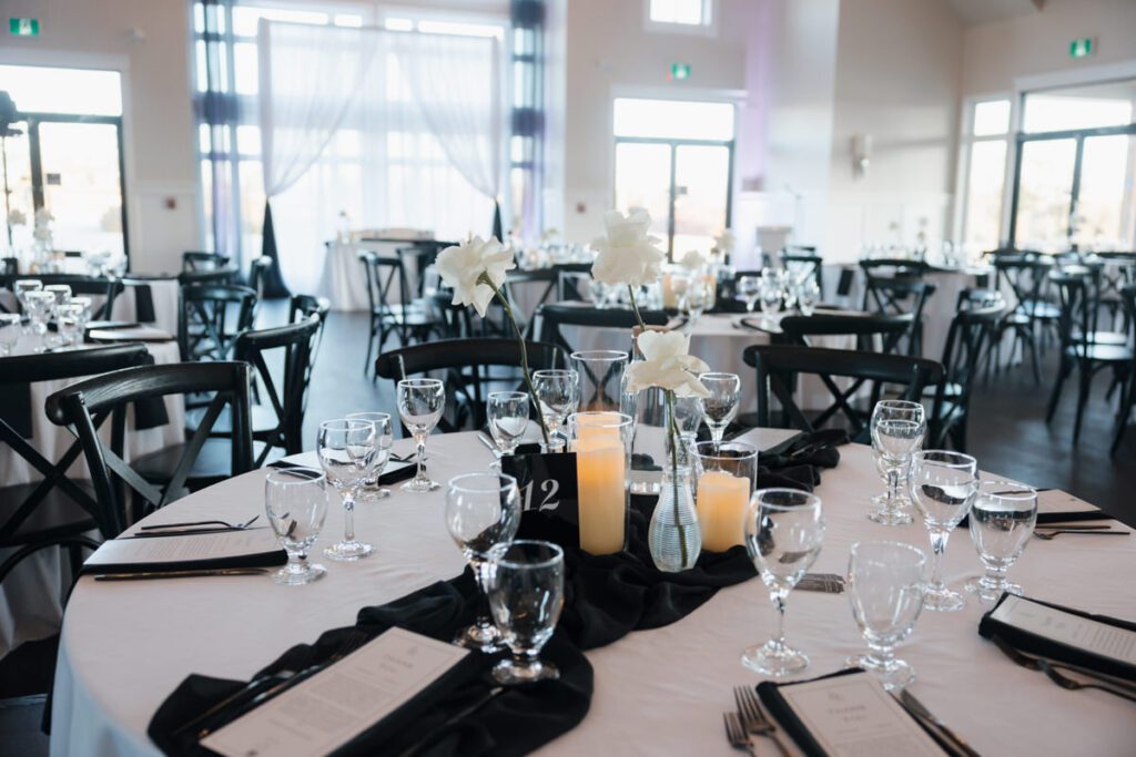 Elegant black and white reception decor at The Glen at Crossmount, styled by Infinity Events & Decor for a timeless wedding celebration.