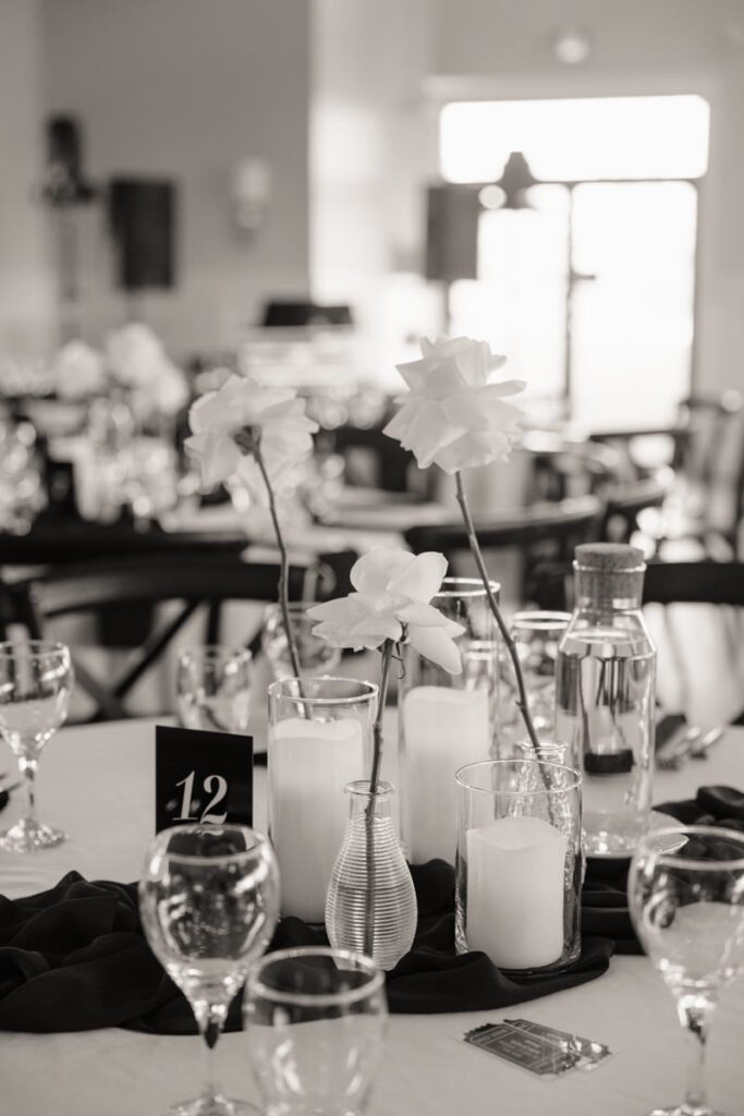 Elegant black and white reception decor at The Glen at Crossmount, styled by Infinity Events & Decor for a timeless wedding celebration.
