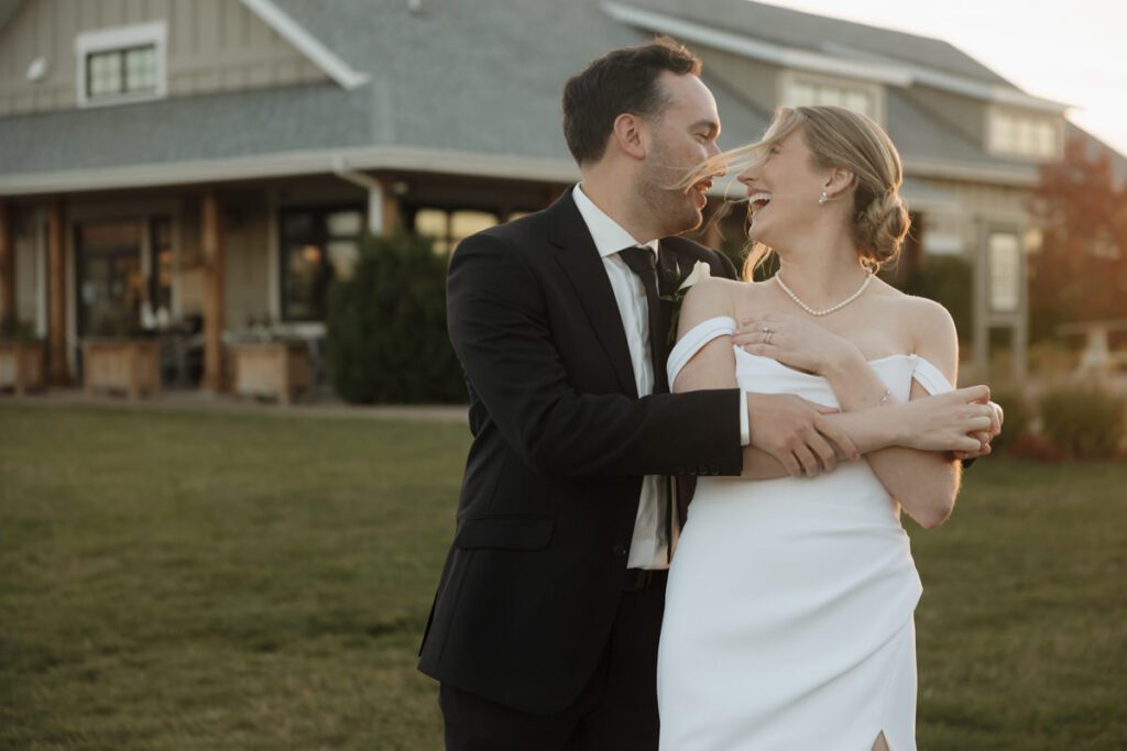 Golden hour portraits of the couple surrounded by fall foliage, radiating love and elegance on their wedding day in Saskatoon