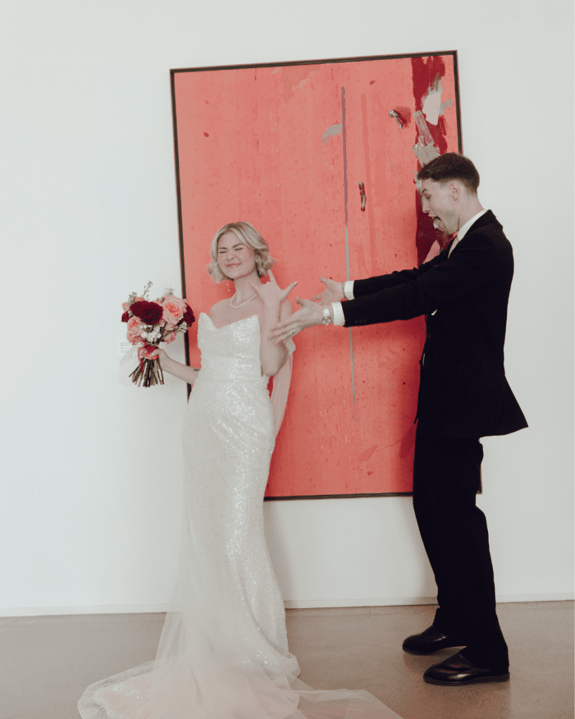Bride and groom taking in a private moment amongst the remai modern art