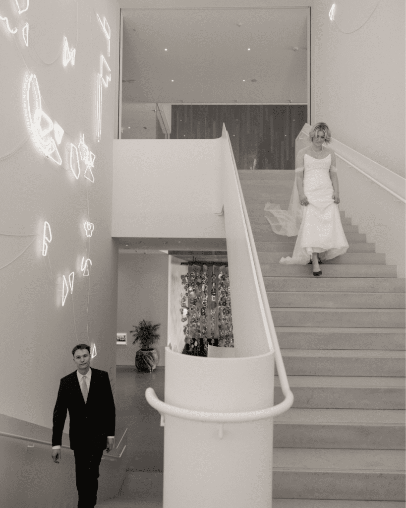 Bride and groom walking towards their first look