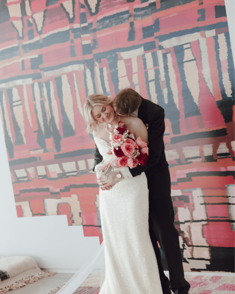 Bride and groom taking in a private moment amongst the remai modern art