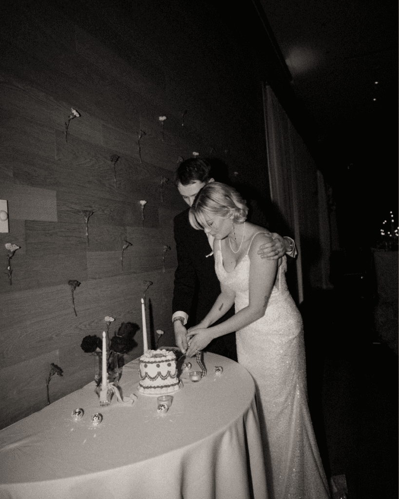 Bride and groom cutting their vintage heart cake