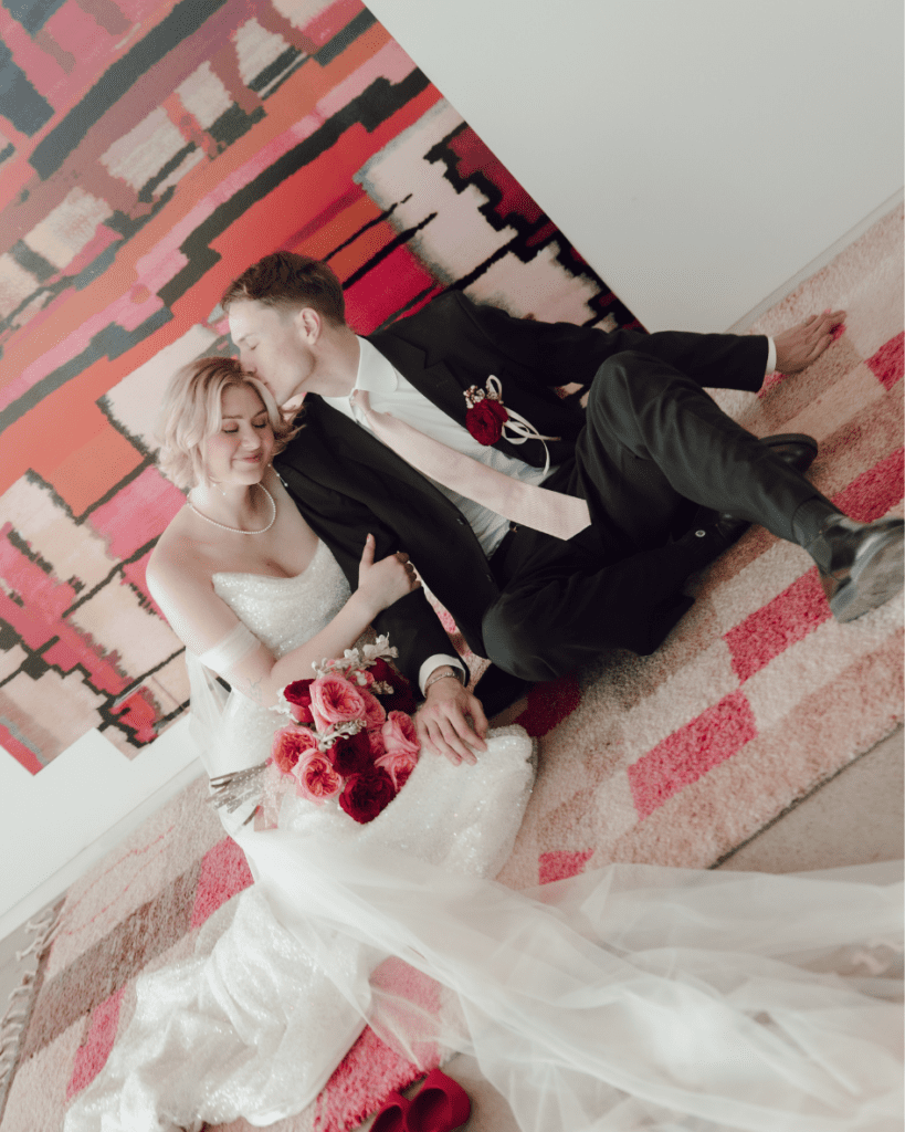 Bride and groom taking in a private moment amongst the remai modern art