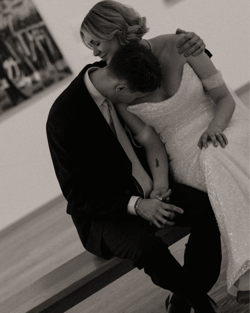 Bride and groom taking in a private moment amongst the remai modern art gallery