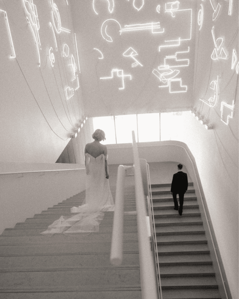 Bride and groom walking towards eachother for their first look