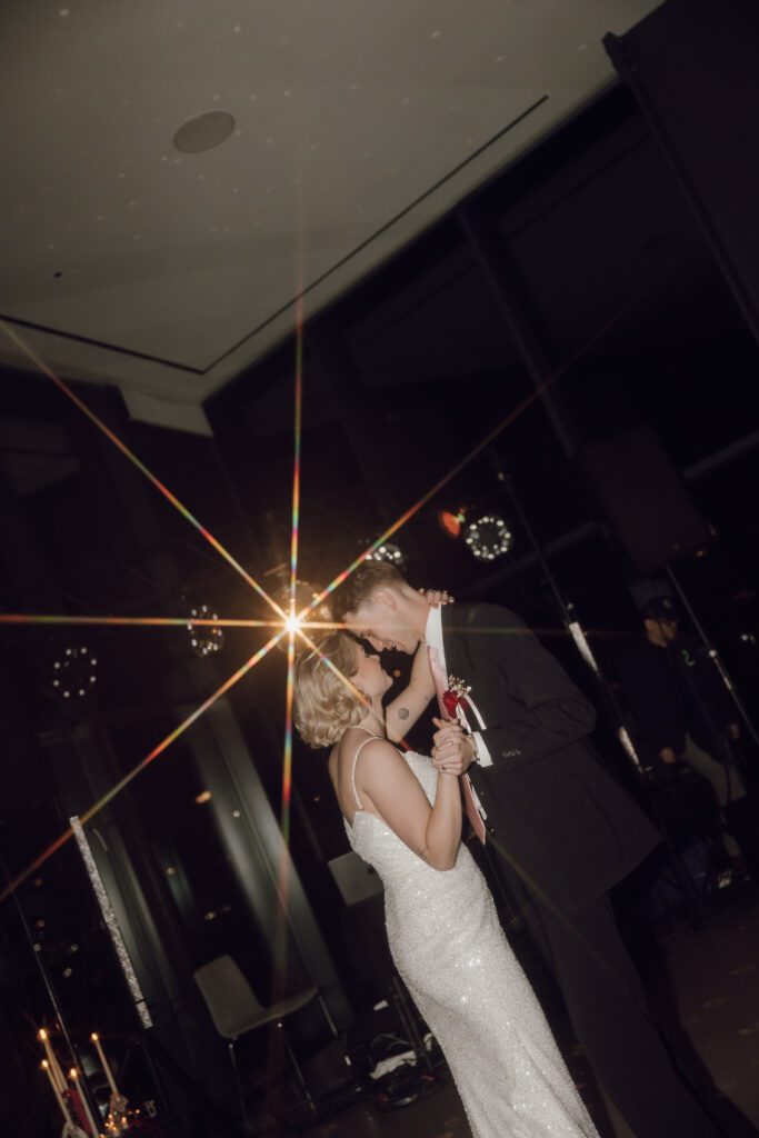 Contemporary wedding setup in the atrium at Remai Modern, Saskatoon, with modern art and panoramic river views