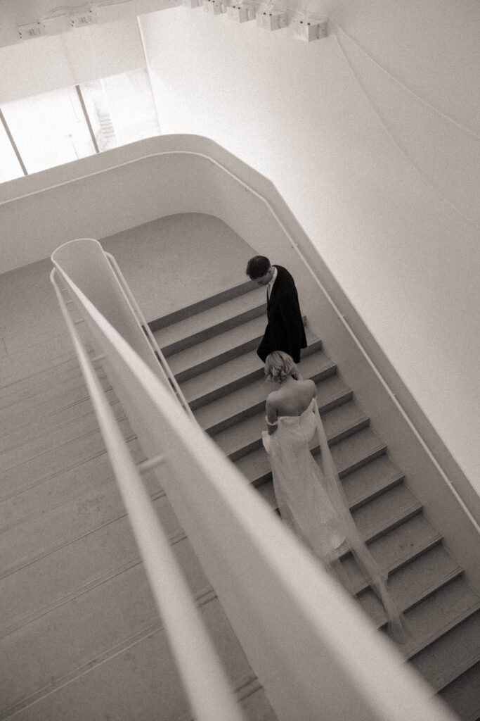 Contemporary wedding setup in the atrium at Remai Modern, Saskatoon, with modern art and panoramic river views