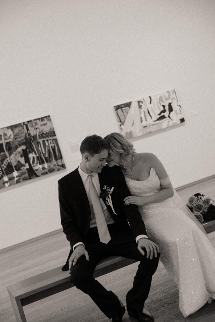 Contemporary wedding setup in the atrium at Remai Modern, Saskatoon, with modern art and panoramic river views