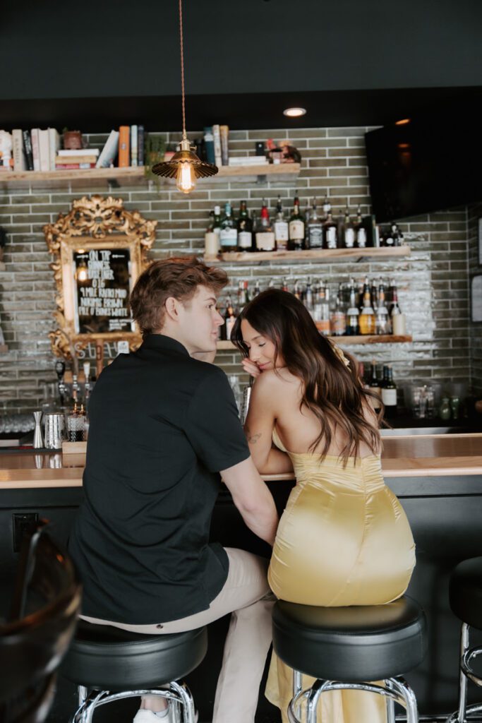 Elegant modern couples photoshoot inside Cocktail YXE bar