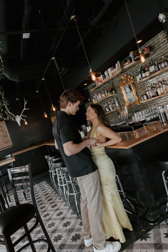 Elegant modern couples photoshoot inside Cocktail YXE bar