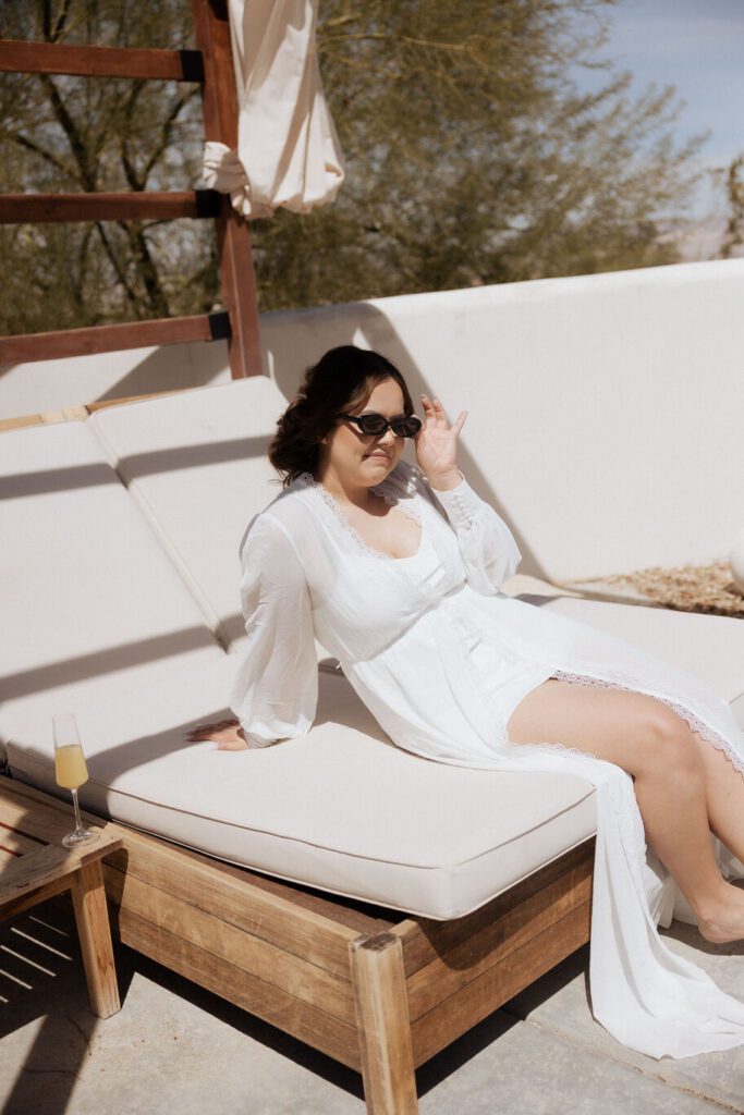 Bride enjoying the morning poolside prior to elopement