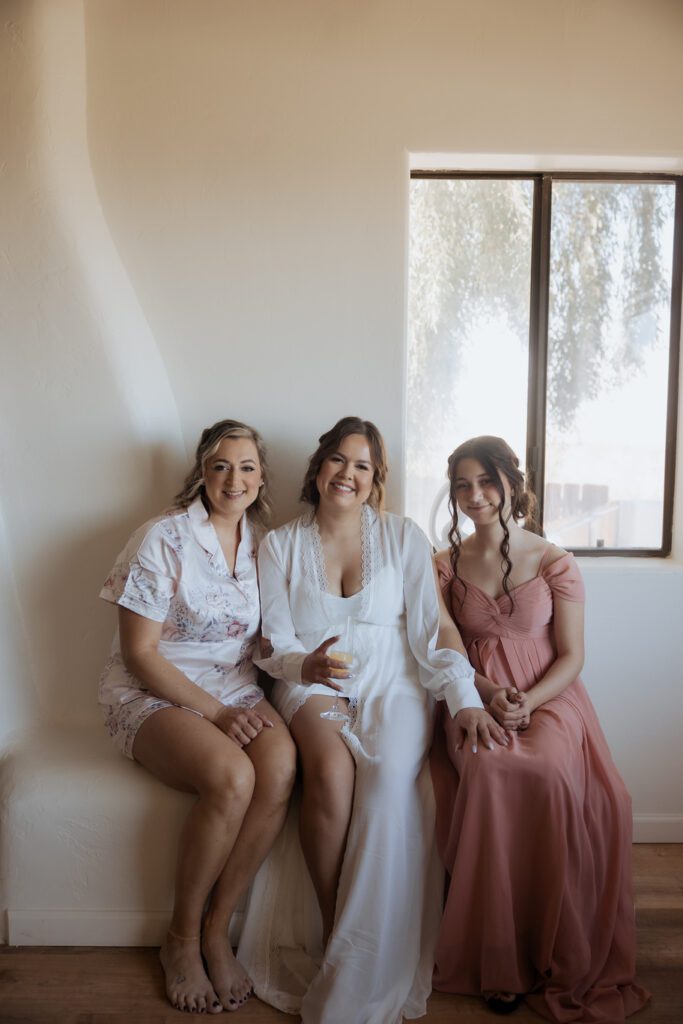 Bride hugging her niece after the ceremony in Joshua Tree