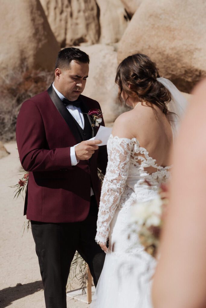 Intimate desert ceremony at Split Rock in Joshua Tree National Park with close family present