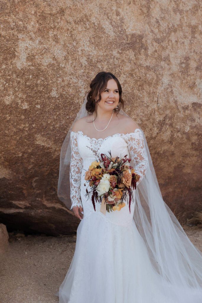 Golden hour portraits of newlyweds in Joshua Tree desert landscape