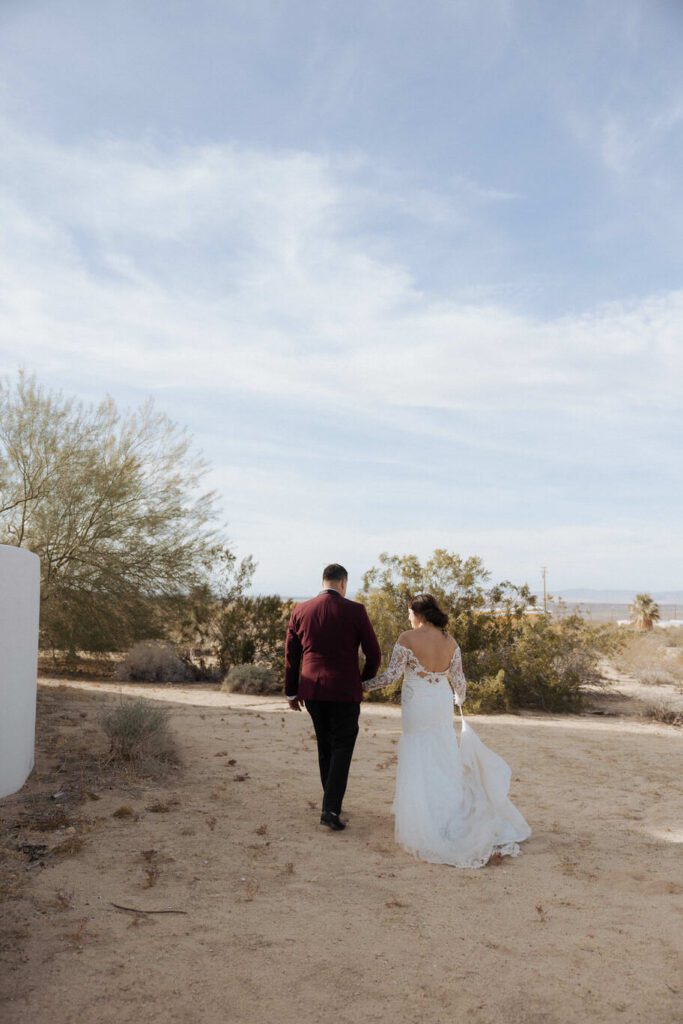 Golden hour portraits of newlyweds in Joshua Tree desert landscape