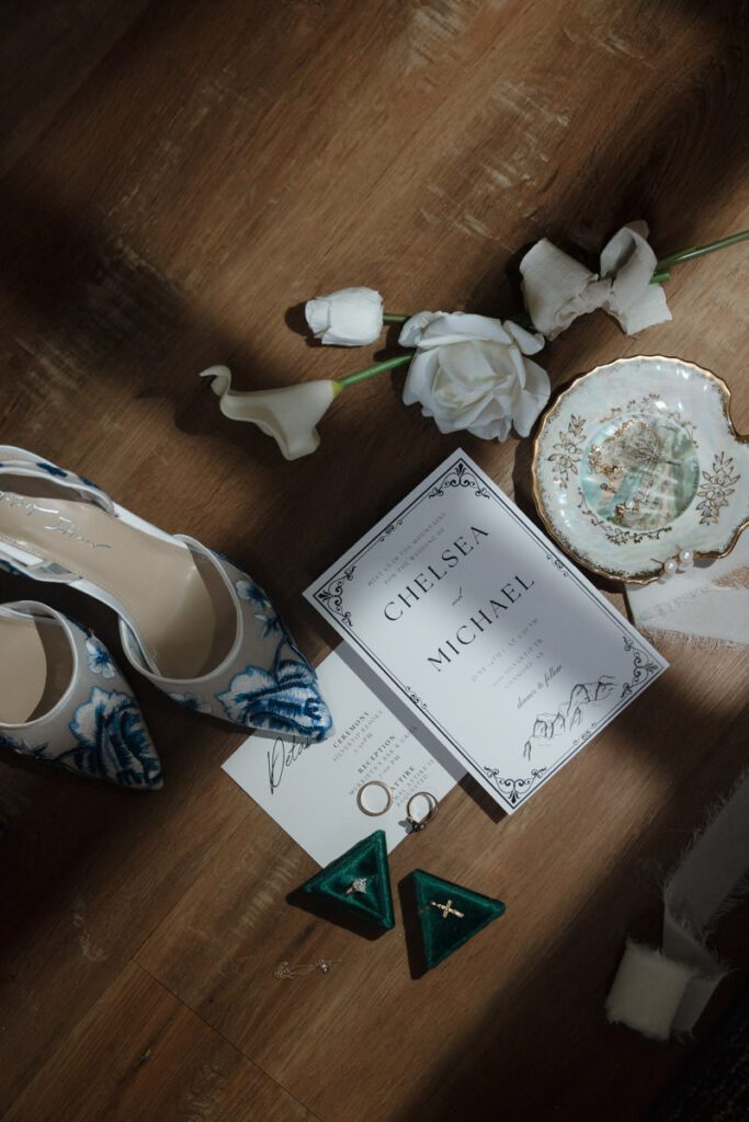 brides detail shots in a moody flat lay