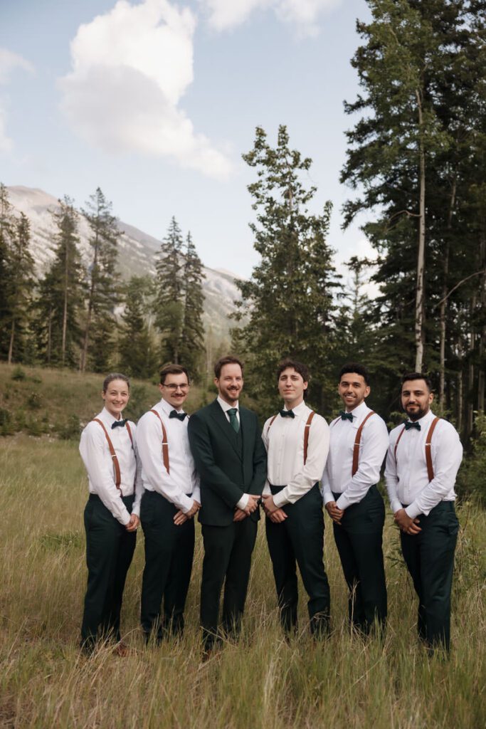 groom and his groomsmen in mountain portraits