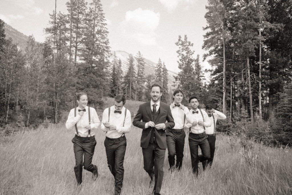 groom and his groomsmen in mountain portraits