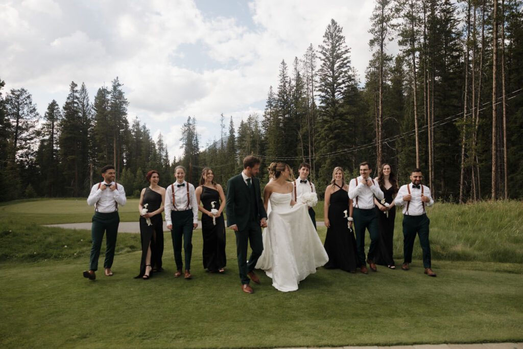 Mountain view wedding portraits with bride and groom smiling