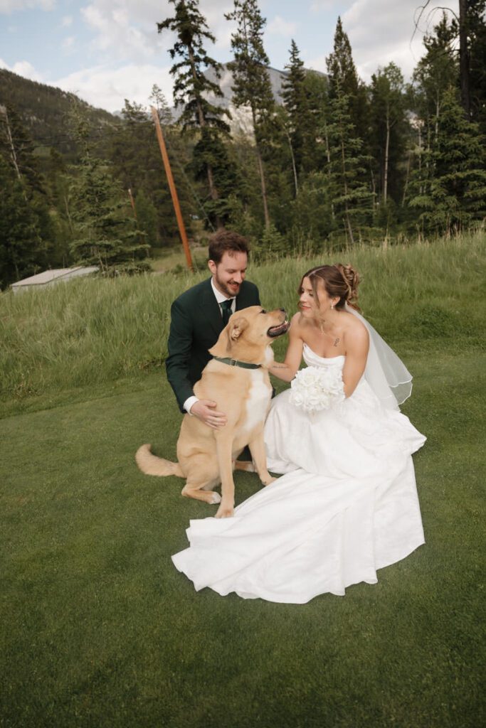 Mountain view wedding portraits with bride and groom smiling