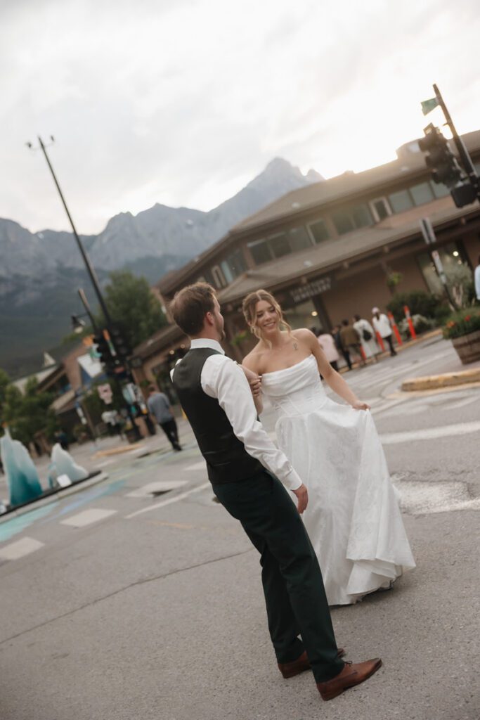 Couple embracing during golden hour in downtown canmore