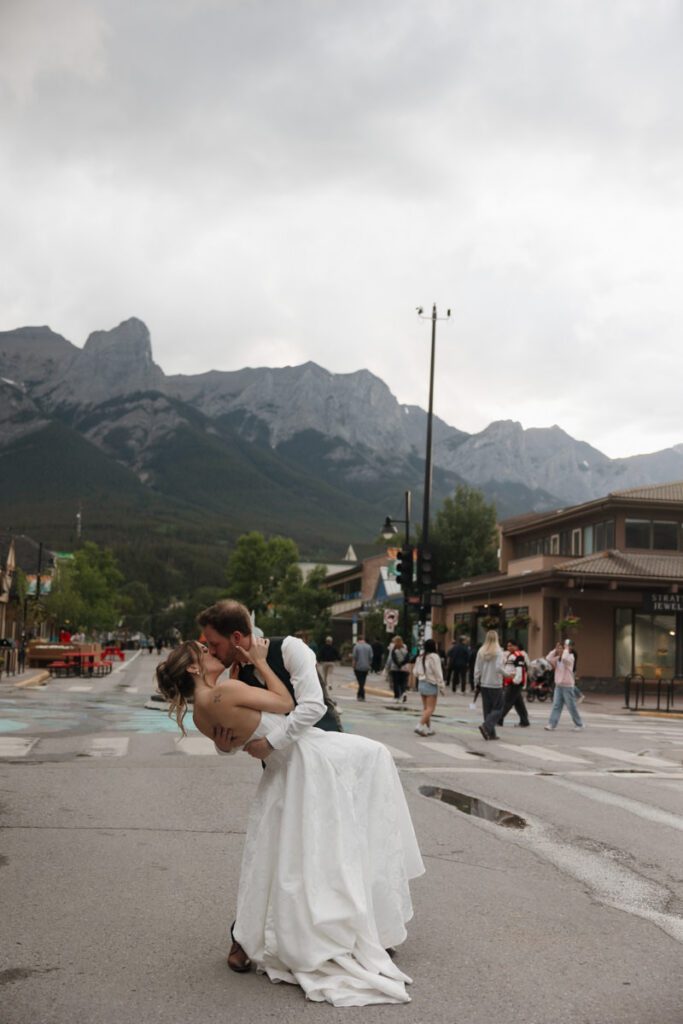 Couple embracing during golden hour in downtown canmore