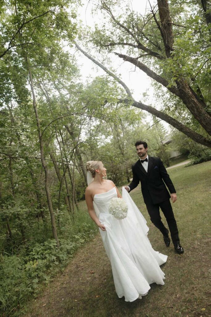 couple walking during their moon lake wedding photography