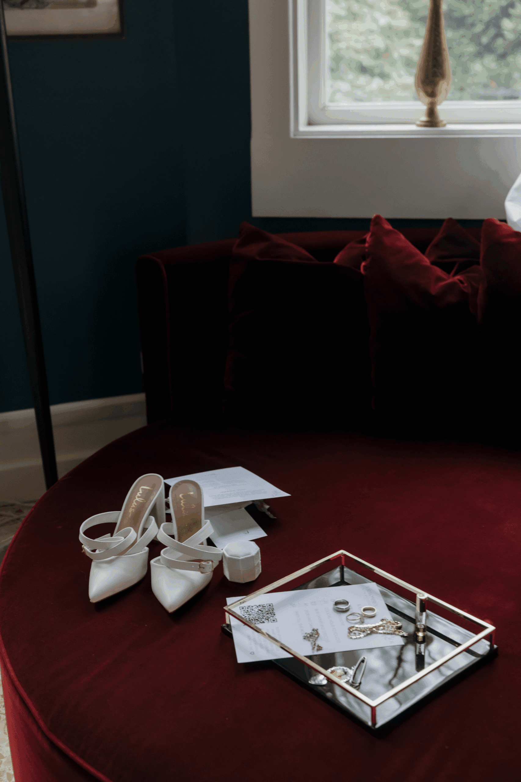 Bride getting ready inside Hjelmsjöborg Castle with soft morning light and elegant details.